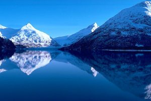 Alaska. Chugach Mts. Portage Glacier and Portage Lake, mountain reflection in water.